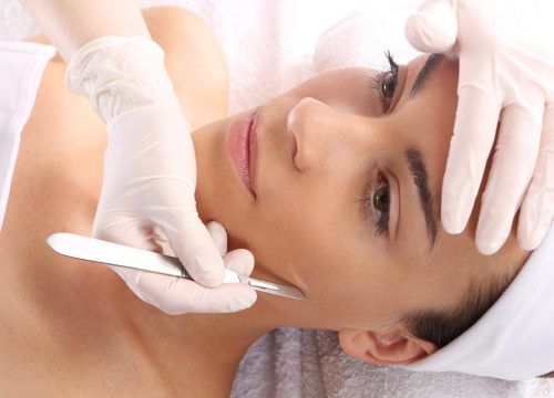 Photo of a woman getting a dermaplaning treatment